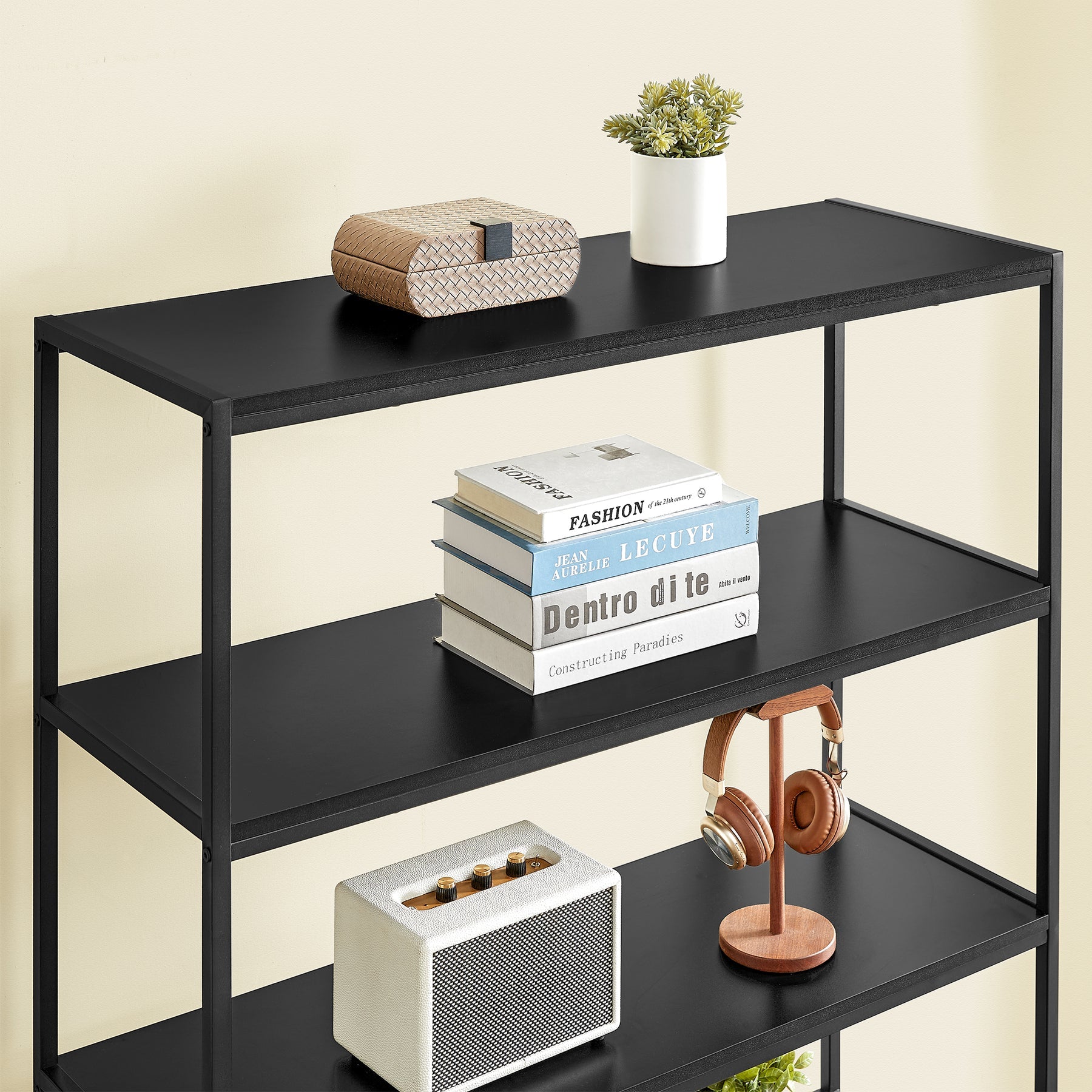 Bogreol i moderne industrielt design - Sort metal m. trælåger